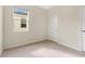 Well-lit bedroom with window and neutral decor at 7836 June Ln, Wildwood, FL 34785
