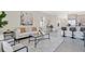 Open concept living room and kitchen with modern decor and stylish furnishings at 7836 June Ln, Wildwood, FL 34785