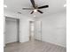 Bright bedroom with ceiling fan and spacious closet at 1041 Ne 130Th Ter, Silver Springs, FL 34488