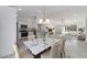 Kitchen and dining area with open floor plan at 1041 Ne 130Th Ter, Silver Springs, FL 34488