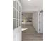 View through the front door showing the living room and kitchen at 1041 Ne 130Th Ter, Silver Springs, FL 34488