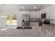 Kitchen with stainless steel appliances and granite countertops at 1041 Ne 130Th Ter, Silver Springs, FL 34488