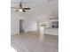 Open living room with vinyl plank flooring and high ceilings at 1041 Ne 130Th Ter, Silver Springs, FL 34488