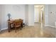 Cozy home office with a wooden desk and chair, near the entryway at 120 Bayou Bend Rd, Groveland, FL 34736