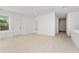 Spacious living area with light flooring and access to other rooms at 1212 Pomegranite Ave, Sanford, FL 32771