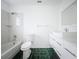 Clean bathroom, featuring a shower/tub combo and marble tile at 14837 Siplin Rd, Winter Garden, FL 34787