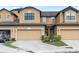 Two-story townhome with attached garage at 2469 Seven Oaks Dr, Saint Cloud, FL 34772