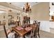 Elegant dining room featuring a formal dining table and chandelier at 3871 Dallas Blvd, Orlando, FL 32833