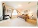 Main bedroom with large window and plush bedding at 4027 Oakrise Loop, Davenport, FL 33837