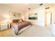 Bright bedroom with large window and modern decor at 4027 Oakrise Loop, Davenport, FL 33837