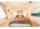 Spacious bedroom with large window and modern decor at 4027 Oakrise Loop, Davenport, FL 33837