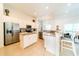 Modern kitchen boasting stainless steel appliances and an island with seating at 4027 Oakrise Loop, Davenport, FL 33837