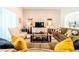Inviting living room with plush seating and a large screen TV at 4027 Oakrise Loop, Davenport, FL 33837
