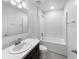 Bathroom with tub, vanity, and mirror at 4404 Desert Rose Ave, Kissimmee, FL 34746