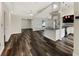 Modern kitchen with island and stainless steel appliances at 5933 Bible Camp Rd, Groveland, FL 34736