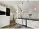 Updated kitchen featuring stainless steel appliances and an island at 5933 Bible Camp Rd, Groveland, FL 34736