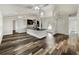 Modern living area, open layout with kitchen and dining area at 5933 Bible Camp Rd, Groveland, FL 34736