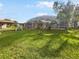 Relaxing screened pool area in backyard at 5933 Bible Camp Rd, Groveland, FL 34736