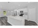 Modern kitchen with white cabinets and island at 6215 148Th Southwest, Ocala, FL 34473