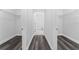 Spacious walk-in closet with gray vinyl flooring and ample shelving at 6215 148Th Southwest, Ocala, FL 34473