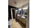 Bathroom boasts double sinks and updated vanities at 761 Americana Ct, Kissimmee, FL 34758