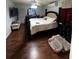 Bright bedroom featuring hardwood floors and ample space at 761 Americana Ct, Kissimmee, FL 34758