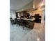 Kitchen with breakfast bar and stone-like counter top at 761 Americana Ct, Kissimmee, FL 34758