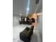 Spacious living room with marble floors and recessed lighting at 761 Americana Ct, Kissimmee, FL 34758