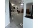 Spacious living room with marble flooring, a fireplace and high ceilings at 761 Americana Ct, Kissimmee, FL 34758