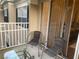 Private balcony with patio furniture and glass top table at 1223 Arbor Lakes Cir, Sanford, FL 32771