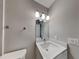 Clean bathroom with a vanity sink and large mirror at 1440 Dann St, Orlando, FL 32804