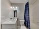Updated bathroom with a modern vanity and shower/tub combo at 1440 Dann St, Orlando, FL 32804
