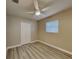 Well-lit bedroom with a ceiling fan and neutral wall colors at 1440 Dann St, Orlando, FL 32804