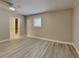 Spacious bedroom with new flooring and an en-suite bathroom at 1440 Dann St, Orlando, FL 32804