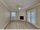 Cozy living room with fireplace and access to the backyard at 1440 Dann St, Orlando, FL 32804