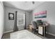 Bright bedroom with desk and gray walls, perfect for a home office at 1473 Broken Oak Dr # C, Winter Garden, FL 34787