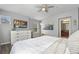 King bedroom with large TV, dresser and access to bathroom at 1473 Broken Oak Dr # C, Winter Garden, FL 34787