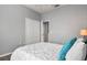 Spacious bedroom with double door closet and wood-look flooring at 1473 Broken Oak Dr # C, Winter Garden, FL 34787