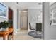 Bright dining area with glass table and view of kitchen and entry at 1473 Broken Oak Dr # C, Winter Garden, FL 34787