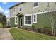 Front entrance of townhome with landscaping and walkway at 1473 Broken Oak Dr # C, Winter Garden, FL 34787