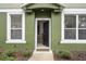 Open front door revealing interior of the townhome at 1473 Broken Oak Dr # C, Winter Garden, FL 34787