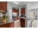 Modern kitchen with stainless steel appliances and granite countertops at 1473 Broken Oak Dr # C, Winter Garden, FL 34787