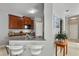 Modern kitchen with granite countertops and dark wood cabinets at 1473 Broken Oak Dr # C, Winter Garden, FL 34787
