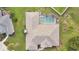 Aerial view showing home with pool and fenced backyard at 1556 Auburn Oaks Ct, Auburndale, FL 33823