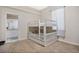 Bright bedroom with a bunk bed and carpet flooring at 1556 Auburn Oaks Ct, Auburndale, FL 33823