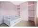 Charming bedroom with built-in shelves and a day bed at 1556 Auburn Oaks Ct, Auburndale, FL 33823