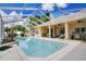 Inviting screened pool with patio furniture at 1556 Auburn Oaks Ct, Auburndale, FL 33823