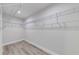 Spacious walk-in closet with wire shelving at 157 S Lakeview Dr, Lake Helen, FL 32744