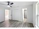 Bright bedroom with en-suite bathroom and walk-in closet at 22474 Sw Rainbow Lakes Blvd, Dunnellon, FL 34431