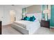 Spacious bedroom with plush bedding and en-suite bathroom access at 4141 Giorgio Dr, Winter Haven, FL 33884